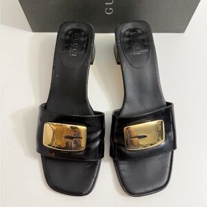 Gucci Black Leather Slide Mules with Gold Hardware